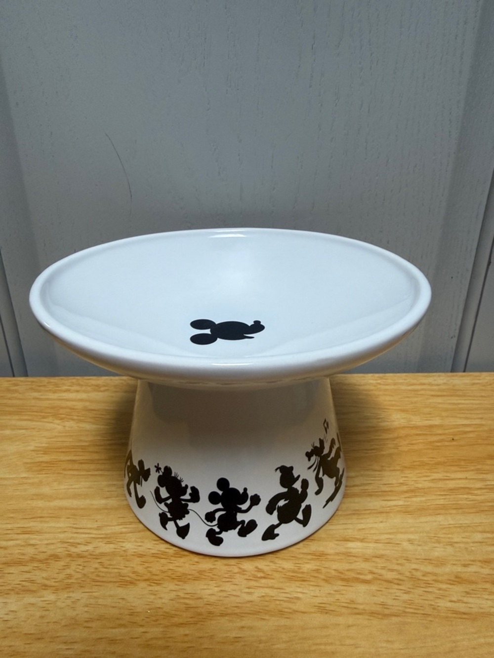 Disney White Ceramic Pet Pedestal Bowl with Black Character Silhouettes